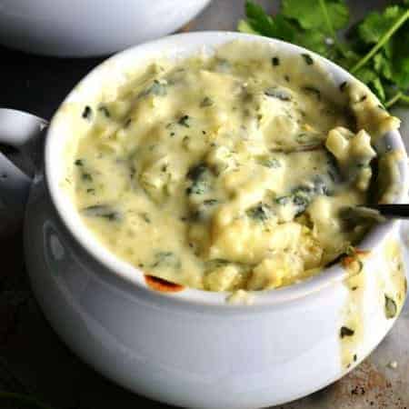 Chile Relleno Soup. A creamy poblano soup topped with an open faced chile relleno.