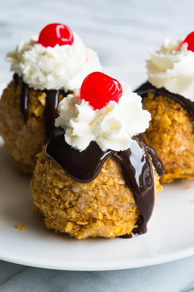 An easy to make Mexican Fried Ice Cream. All the flavors of the classic without the actual frying!! Perfect individual desserts for summer!