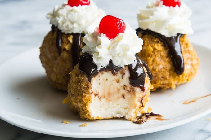An easy to make Mexican Fried Ice Cream. All the flavors of the classic without the actual frying!! Perfect individual desserts for summer!