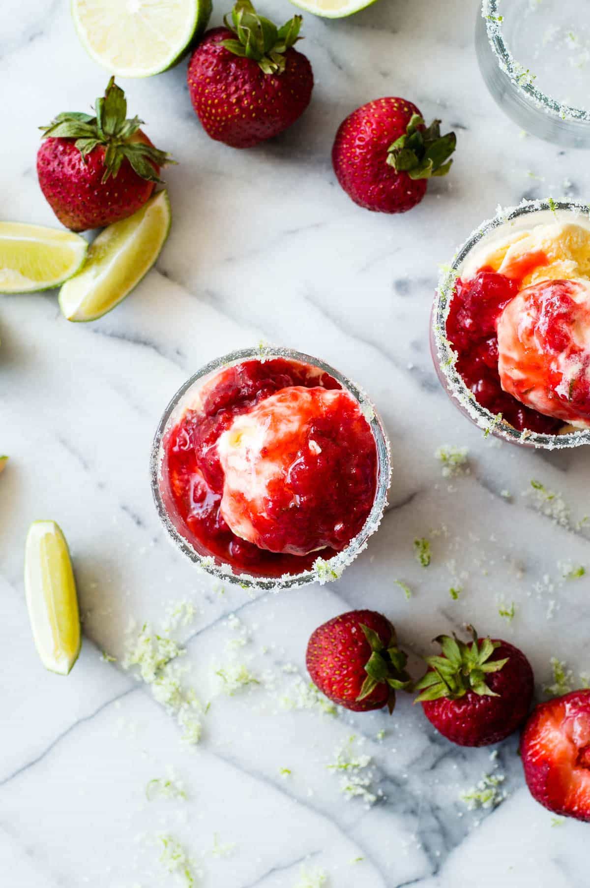 This Strawberry Margarita Dessert Sauce is the perfect topping for your ice cream, cakes, cookies, cheesecakes. Super easy to make, you will be using this on everything! 
