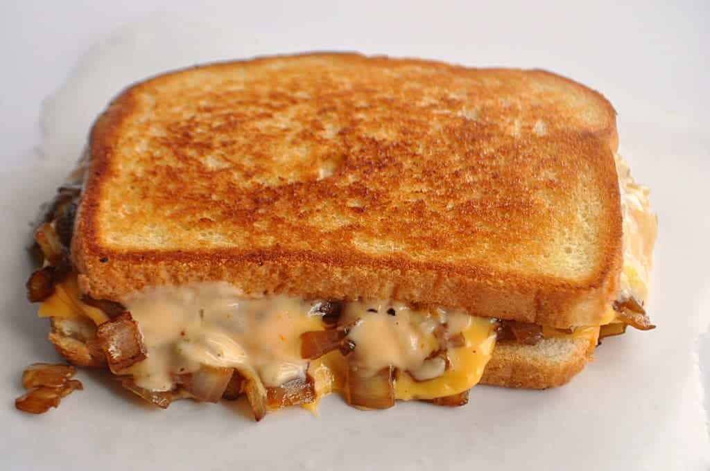 This classic grilled cheese has gone ANIMAL SYLE with grilled onions and a special sauce!  