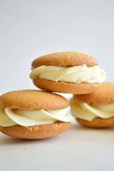 Stacked banana pudding cookie sandwiches.