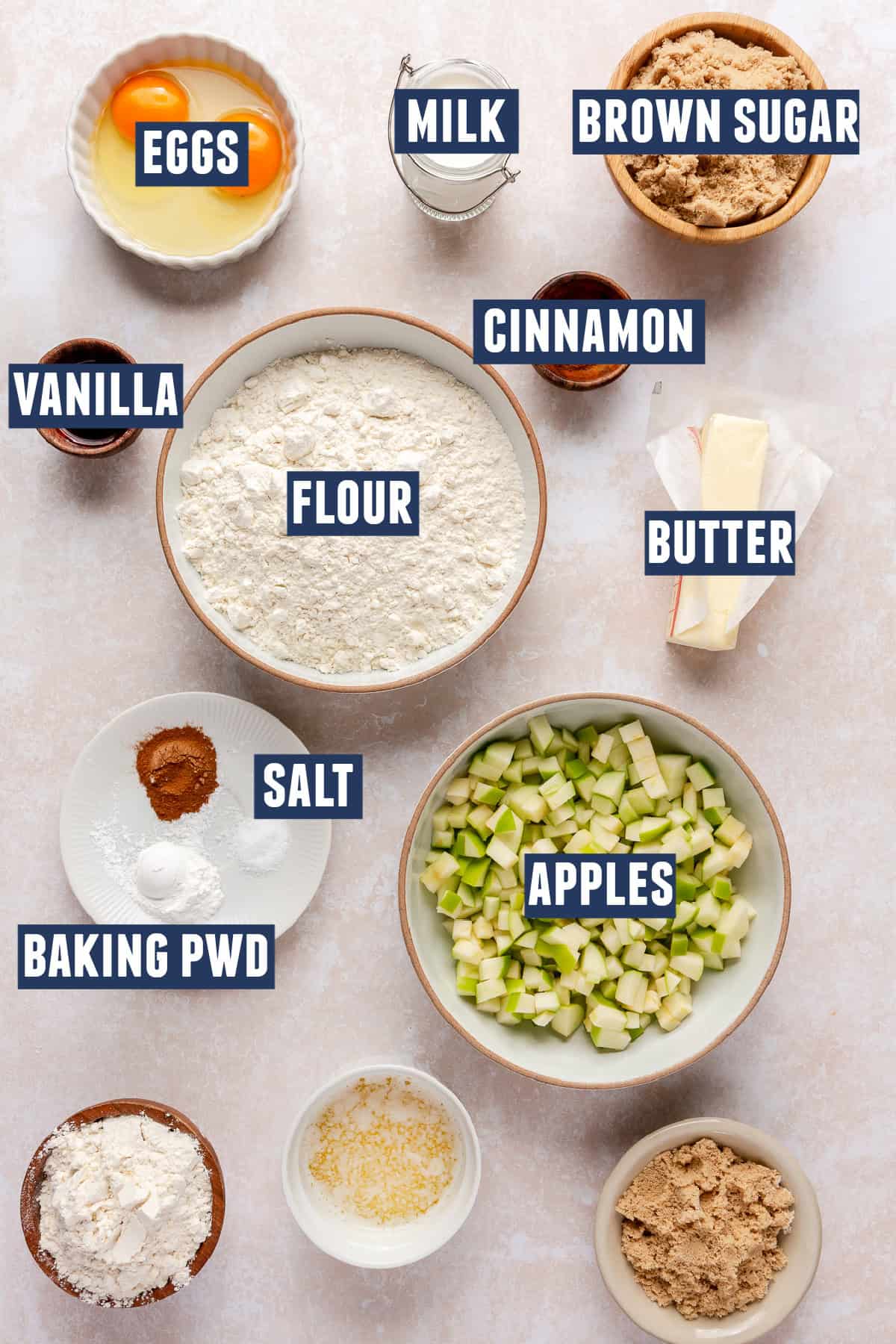 Ingredients needed to make apple muffins.