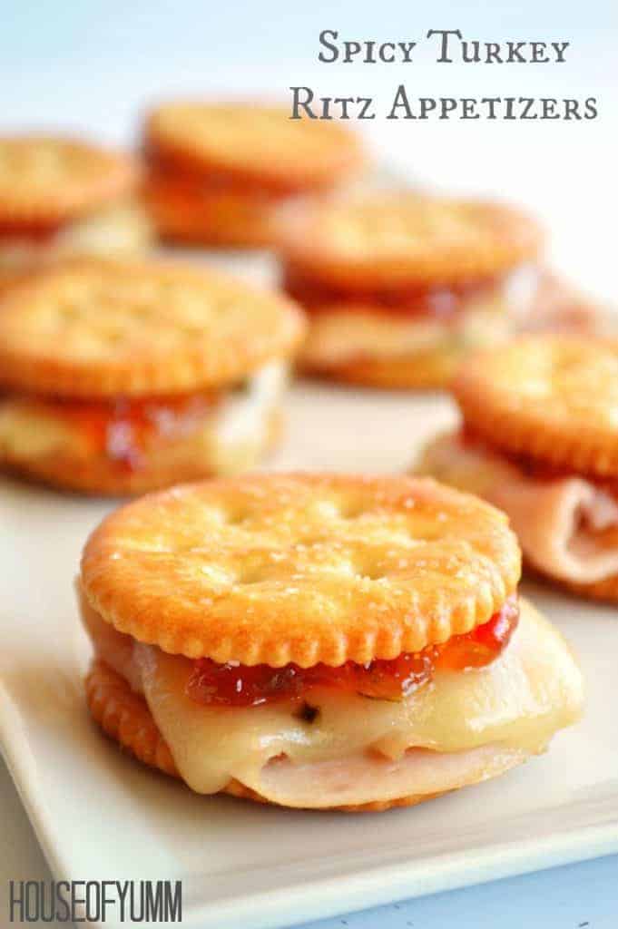 Spicy Turkey Ritz Sandwiches.  Turkey, pepperjack, pepper jelly all loaded on a Ritz cracker for a fun appetizer. 