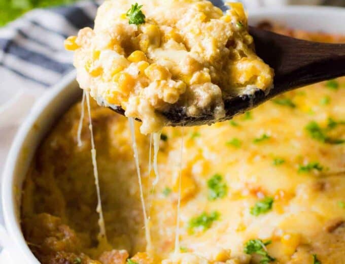 Cheesy Corn Casserole. This EASY classic casserole dish is a must make for Thanksgiving or any holiday. Loaded with cheese, buttery crackers and corn this will quickly become a family favorite!