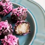 Snowball Truffles! Chocolate covered coconut truffles. Topped with PINK coconut of course!
