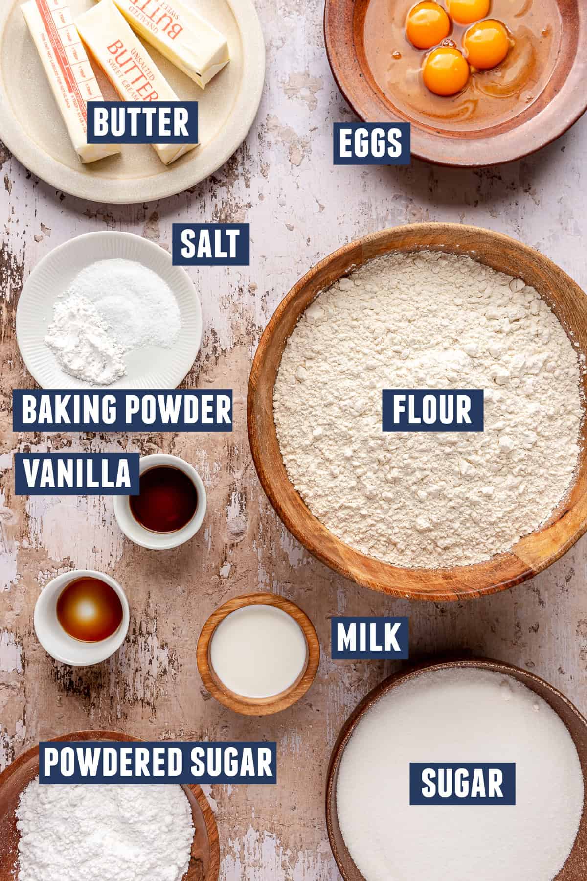 Iced sugar cookie ingredients laid out on the counter. 