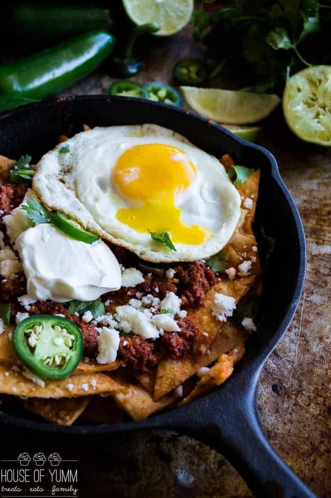 Chilaquiles Rojos. A traditional Mexican breakfast dish with a few Tex Mex additions. This dish is bursting with flavor and spice! 
