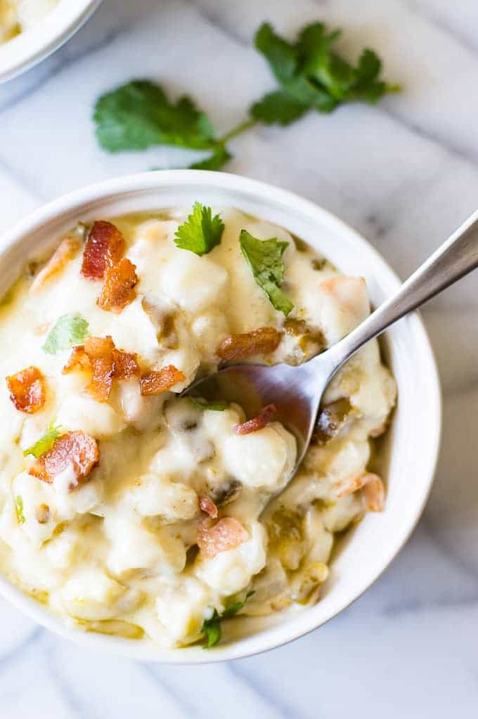 Jalapeño Bacon Hominy is ULTIMATE comfort food. This easy to make super creamy white cheddar hominy is loaded with bacon and jalapeño for extra flavor and heat. Perfect side dish!