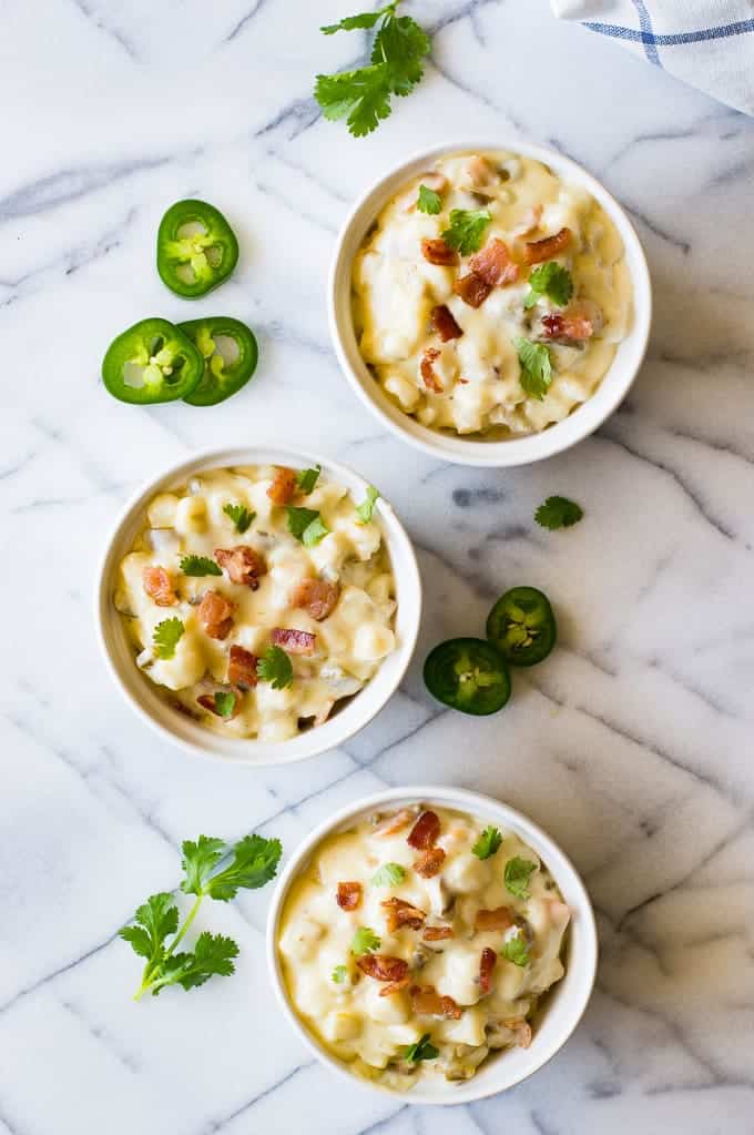 Jalapeño Bacon Hominy is ULTIMATE comfort food. This easy to make super creamy white cheddar hominy is loaded with bacon and jalapeño for extra flavor and heat. Perfect side dish!