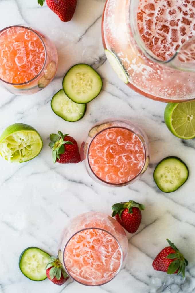 Cool and refreshing Strawberry Cucumber Lime Agua Fresca. This fruit infused water is free of refined sugars and perfect for sipping on hot summer days! 