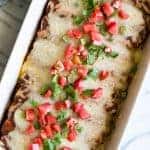 Classic Tex Mex Cheese Enchiladas made with Texas Chili Gravy, a homemade enchilada sauce recipe that is bursting with BOLD flavors. This easy meal can be put together in under 30 minutes making it perfect for a weeknight dinner!