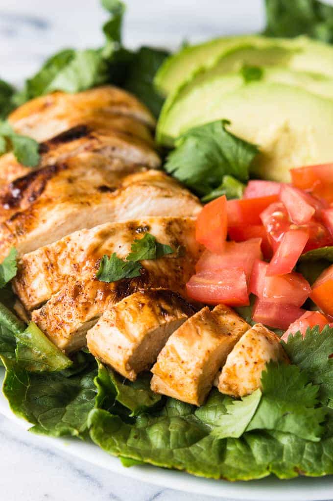 This tender, juicy, zesty chili lime chicken is perfect for topping your salad! This easy recipe takes just minutes to prepare! Perfect for a weeknight dinner!