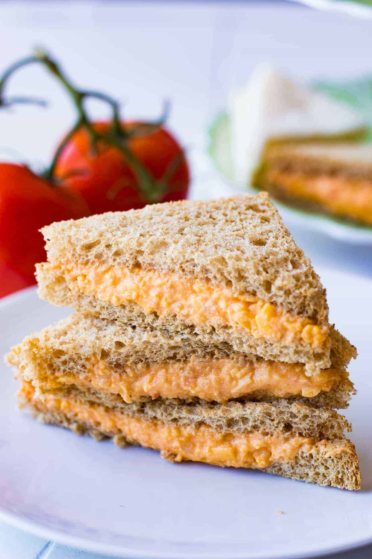 This Tomato Twiddle recipe is perfect as a tea party sandwich. Easy to make, only 3 ingredients, and so flavorful! Get ready to meet your new favorite sandwich!