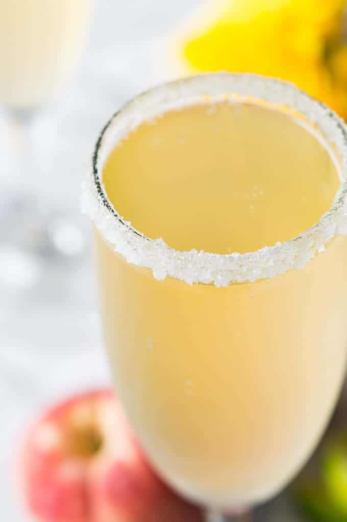 The perfect brunch cocktail! A mixture of a bellini and margarita! Made with peach juice, tequila, and champagne! 