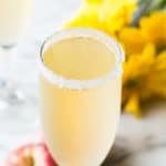 The perfect brunch cocktail! A mixture of a bellini and margarita! Made with peach juice, tequila, and champagne!