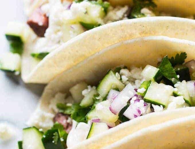 Spicy Habanero Grilled Lamb liven up these tacos, that are a perfect blend of Mexican and Mediterranean flavors! Cool and creamy mojito cole slaw, cucumber salsa, and queso fresco complete the dish! Perfect recipe for grilling season!