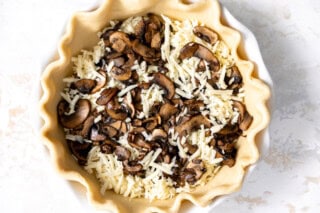 Pie crust filled with mushrooms and cheese.