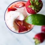 A cold, refreshing strawberry margarita made with fresh strawberries and poured over coconut gelato!