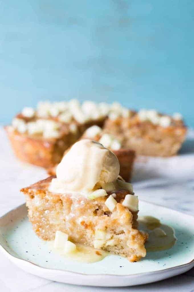 Caramel Apple Skillet cake is bursting with chunks of apple, drizzled with a homemade caramel glaze, and is perfect for Fall baking! 