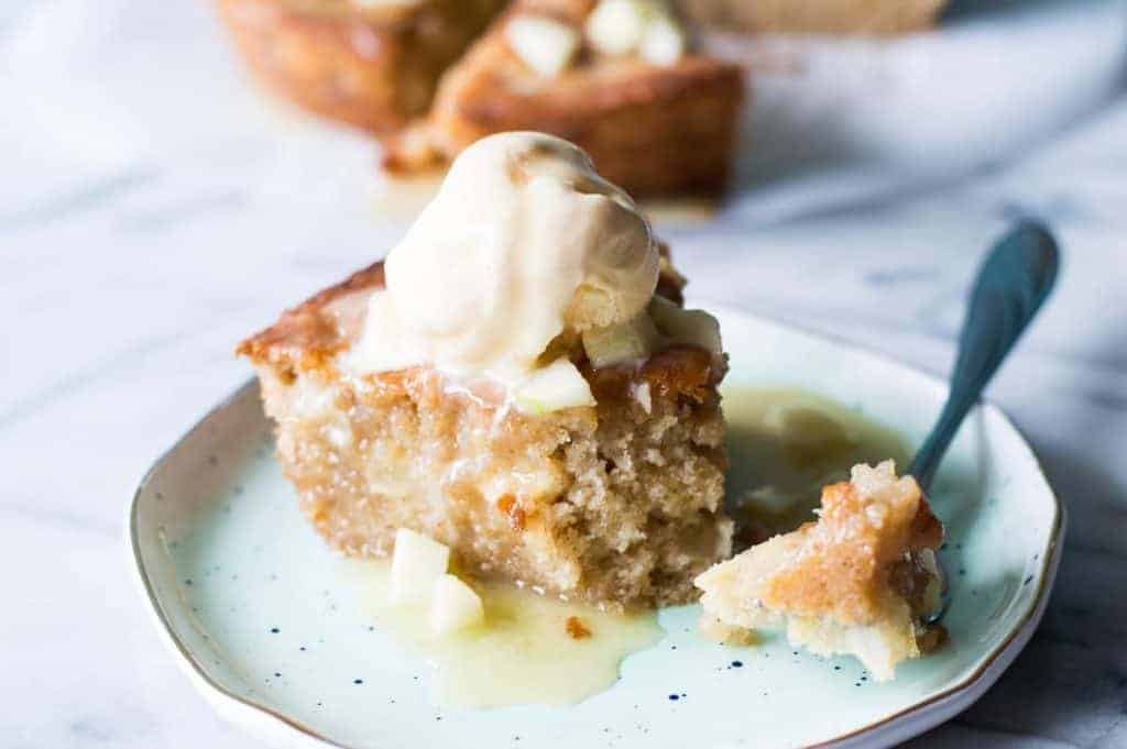 Caramel Apple Skillet cake is bursting with chunks of apple, drizzled with a homemade caramel glaze, and is perfect for Fall baking! 