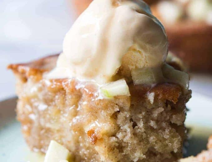 Caramel Apple Skillet cake is bursting with chunks of apple, drizzled with a homemade caramel glaze, and is perfect for Fall baking!