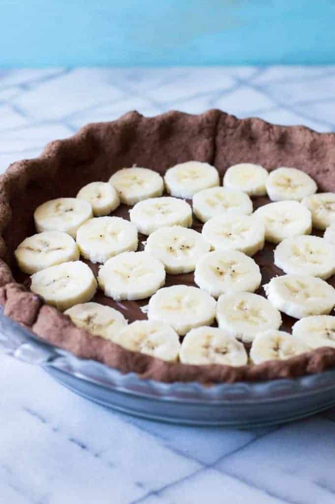 Chocolate Banana Cream Pie. Chocolate pie crust loaded up with layers of chocolate cream, bananas, and vanilla cream. All topped with a thick layer of whipped cream! 