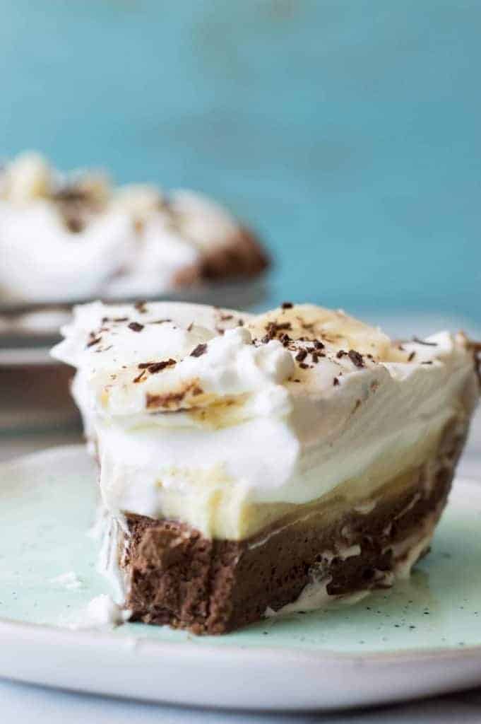 Chocolate Banana Cream Pie. Chocolate pie crust loaded up with layers of chocolate cream, bananas, and vanilla cream. All topped with a thick layer of whipped cream! 