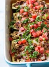 Easy to make Zucchini Boat Chicken Enchiladas! A tasty way to eat more veggies that the whole family will love!