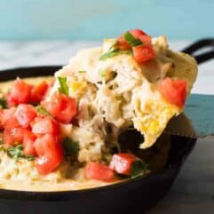 This green chile chicken tamale pie is a quick and easy dinner idea! Flavorful chicken with cheese and green chiles with a cornbread 'crust'. Prepare the chicken ahead of time to make it even quicker! Perfect for a weeknight meal.