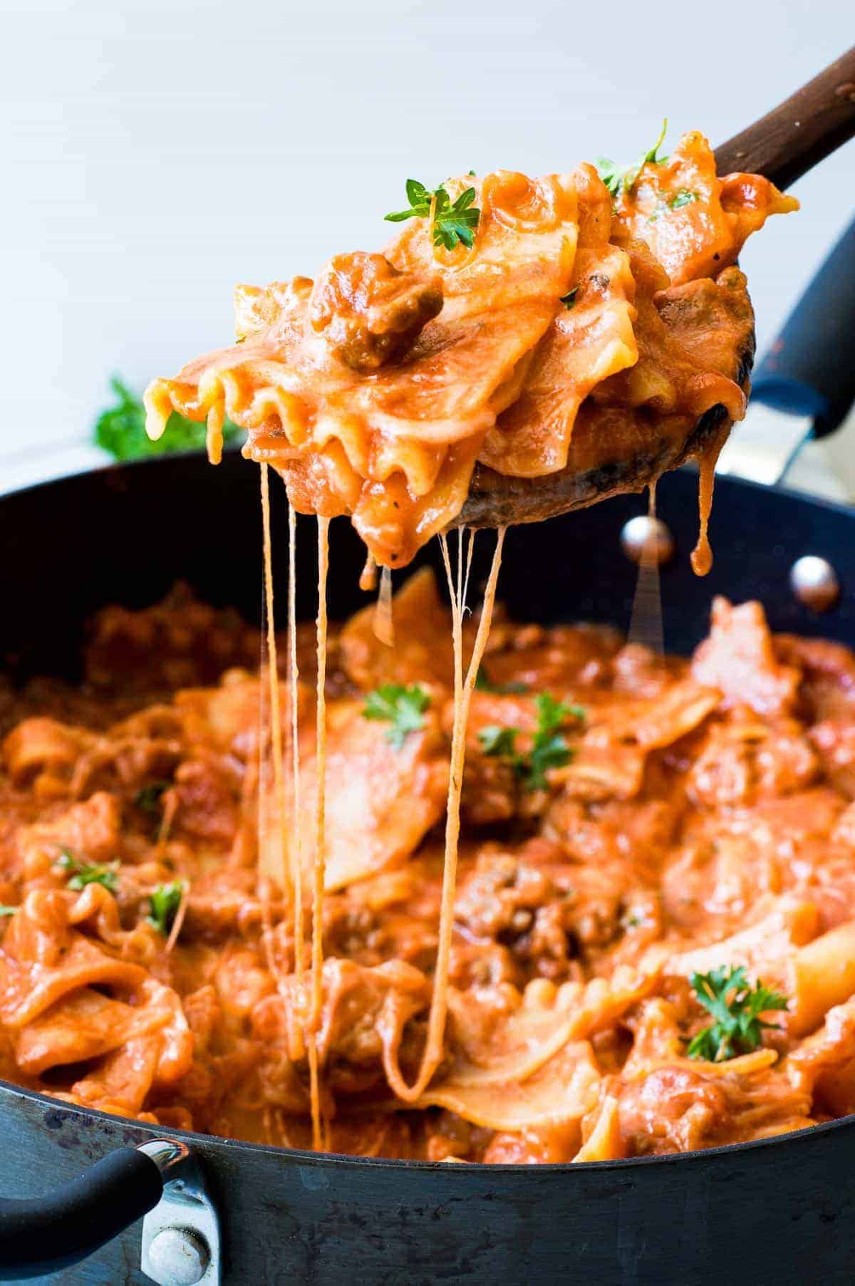 Easy Skillet Lasagna Recipe. This family dinner dish only takes 30 MINUTES and ONE POT to make! This ultimate comforting and cheesy meal is so much easier than making a conventional lasagna. After you try this version you will never need another lasagna recipe!