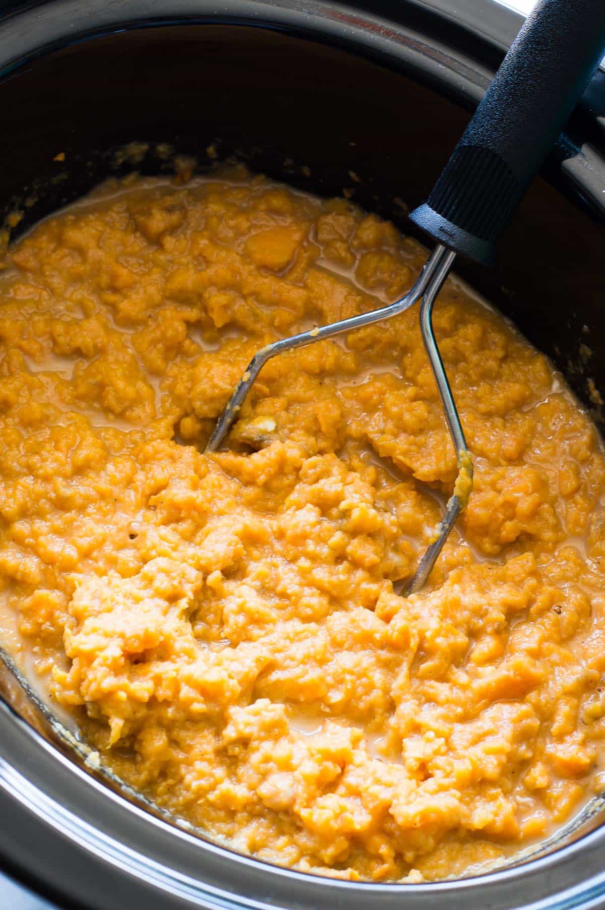 All ingredients mashed together for a sweet potato casserole.