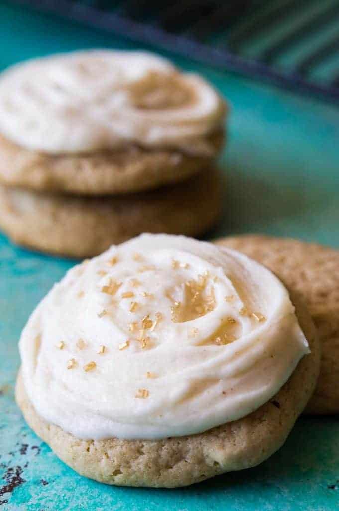 Maple Cookies with Brown Butter Frosting. These ultra soft bakery style cookies are made with real maple syrup and topped with a swirl of BROWN BUTTER frosting!