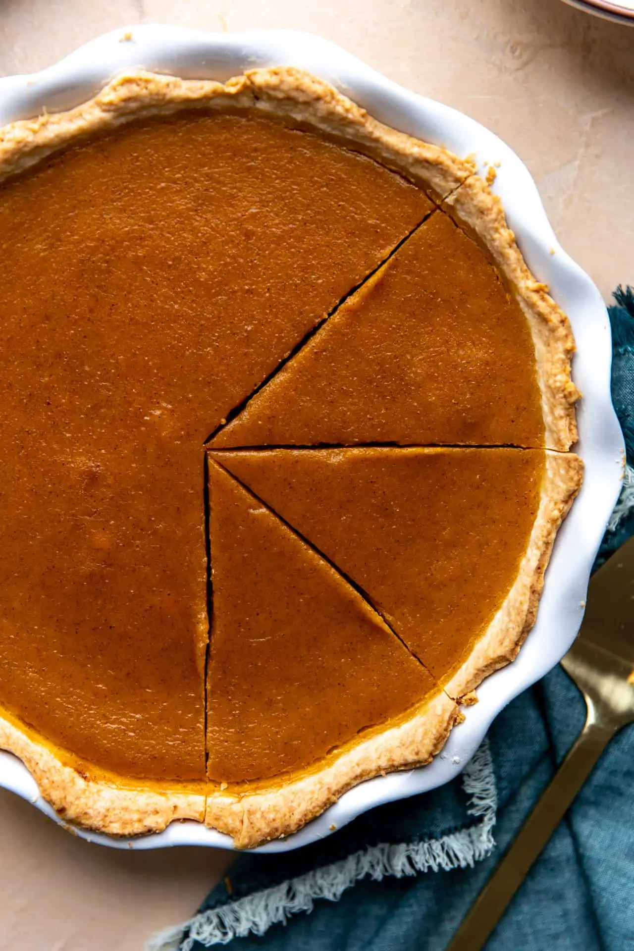 Baked squash pie, sliced and ready to serve. 