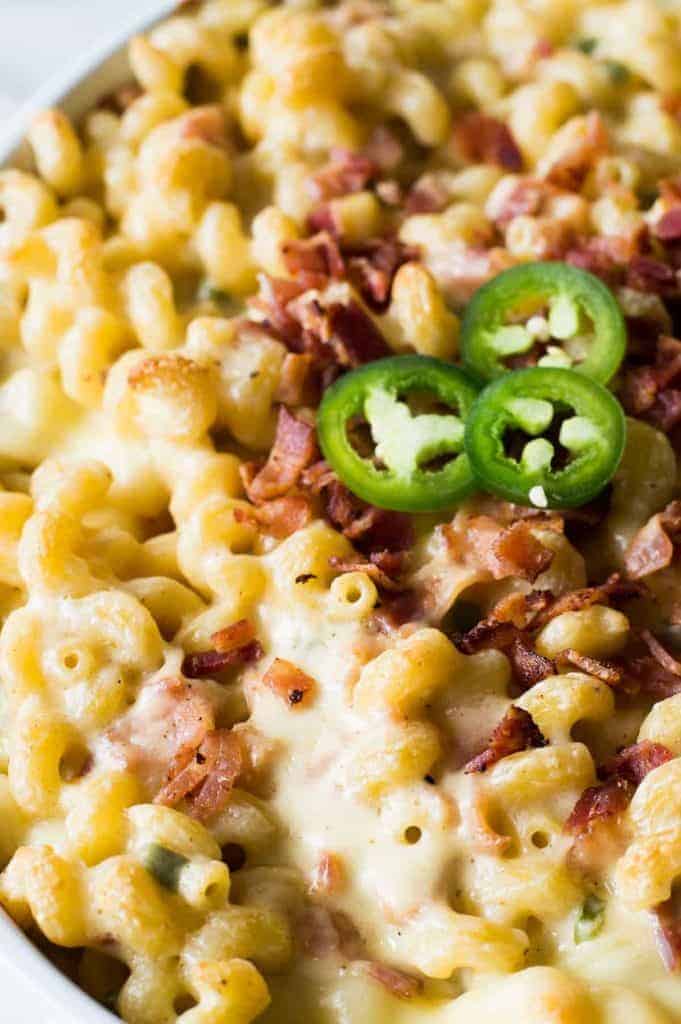Jalapeno Popper Macaroni and Cheese! This macaroni and cheese tastes just like a jalapeño popper!! Loaded up with fresh jalapeño. Bits of crispy bacon. And the homemade sauce is made ultra creamy by adding cream cheese! You will never want another macaroni and cheese again once you try this one!