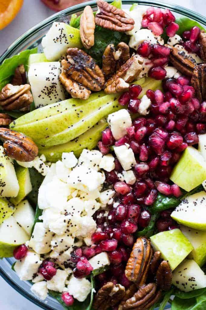 Pear & Pomegranate Salad with Orange Poppyseed Vinaigrette. 