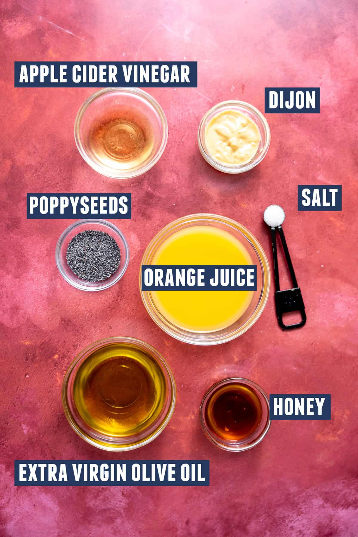 Ingredients needed to make an orange poppyseed dressing. 