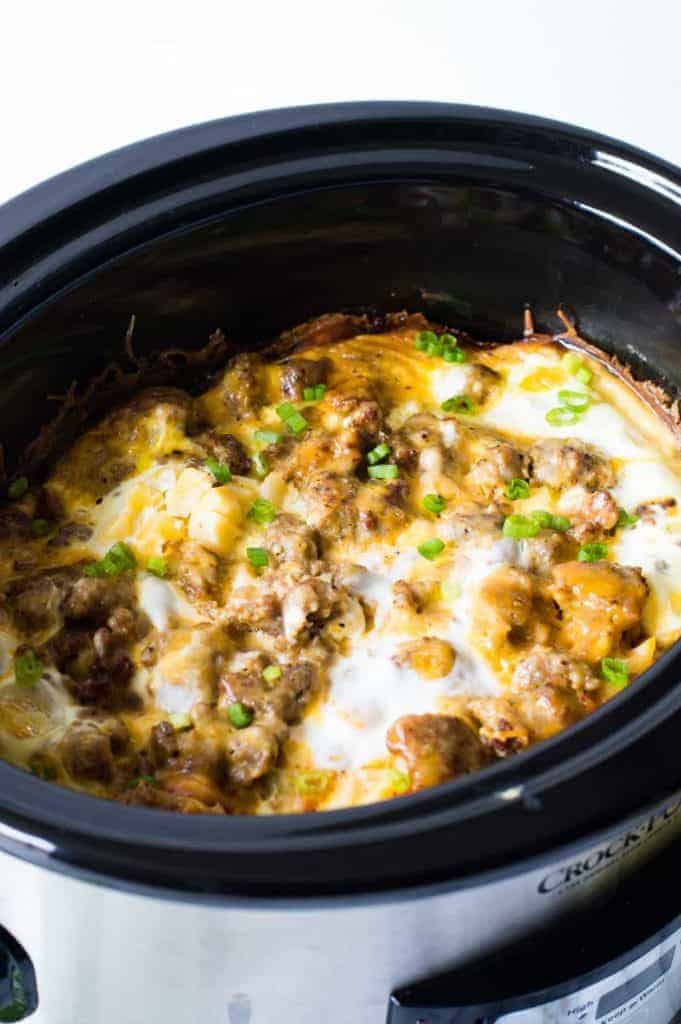 Slow Cooker Breakfast Casserole. This quick and easy to put together breakfast can cook in the slow cooker overnight while you're sleeping!! There's nothing better than waking up to the smell of a homemade breakfast already made. This casserole is loaded up with sausage, diced hash browns, eggs and cheese.