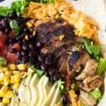 Chicken Taco Salad with juicy chicken bursting with flavor thanks to homemade taco seasoning. All topped with an intoxicating cilantro ranch dressing.