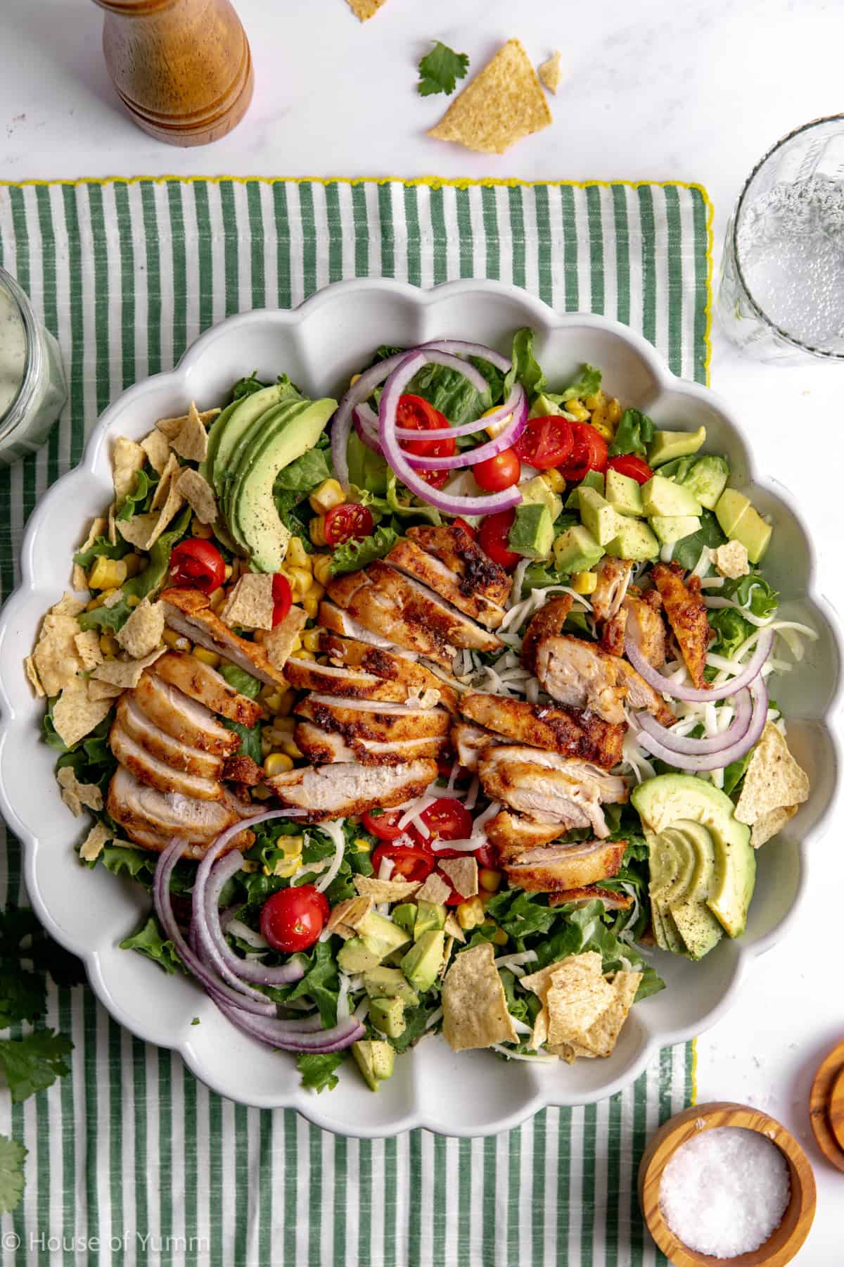 Chicken taco salad layered together before dressing.