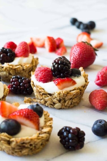 These Fruit and Yogurt Granola Cups are super easy to make for breakfast! Fill with your favorite yogurt and fresh fruits for a complete healthy meal!