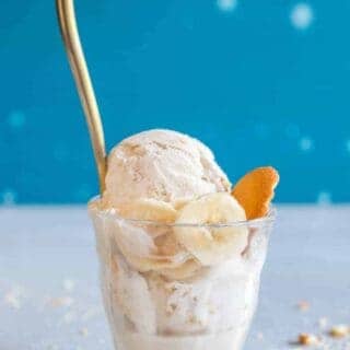 Banana Pudding Ice Cream.  This easy to make ice cream is egg free and made with REAL banana!  Layered with whipped cream and vanilla wafers this ice cream is a fun twist on a classic treat perfect for summer! 