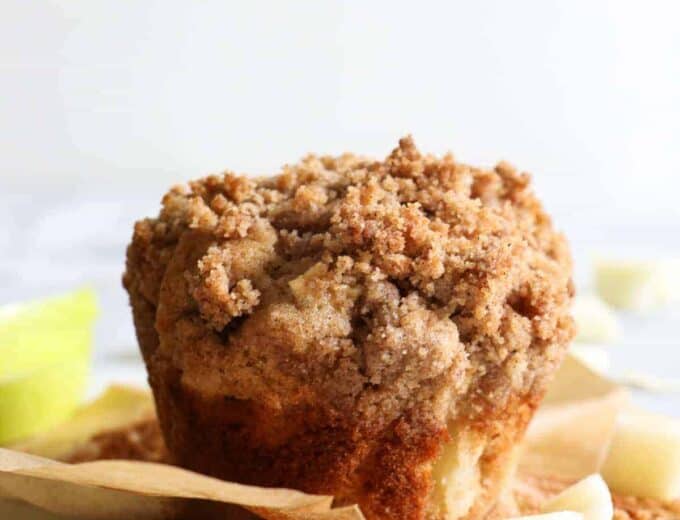 Single Apple Crumb Muffin with the wrapper removed.