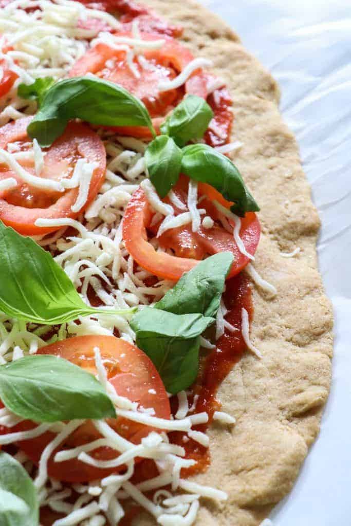 Whole Wheat Pizza Dough.  Crispy, chewy whole wheat pizza dough.  Perfect for loading up with all your favorite toppings!  