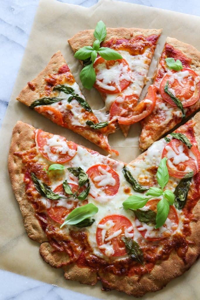 Whole Wheat Pizza Dough.  Crispy, chewy whole wheat pizza dough.  Perfect for loading up with all your favorite toppings!  