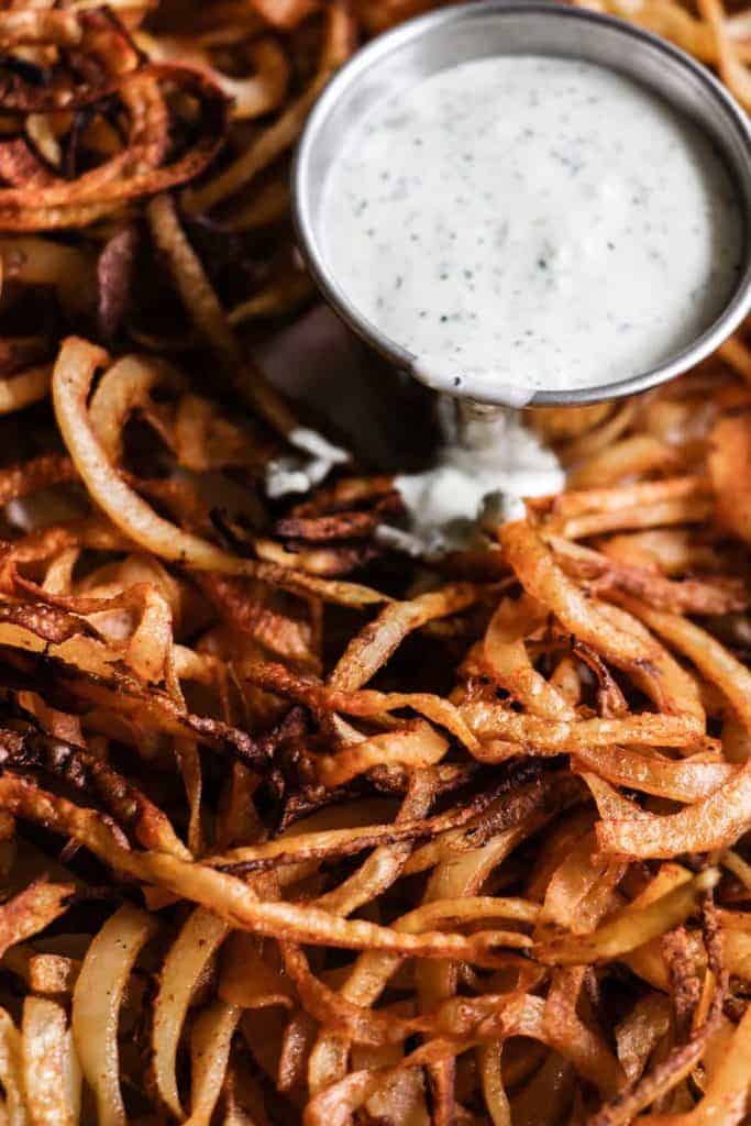 Homemade crispy fries seasoned with chile powder and hit with a dose of lime. Perfect side dish to any Mexican dish or just snacking on! 