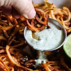 Homemade crispy fries seasoned with chile powder and hit with a dose of lime. Perfect side dish to any Mexican dish or just snacking on!