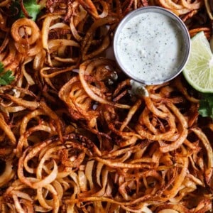 Homemade crispy fries seasoned with chile powder and hit with a dose of lime. Perfect side dish to any Mexican dish or just snacking on!