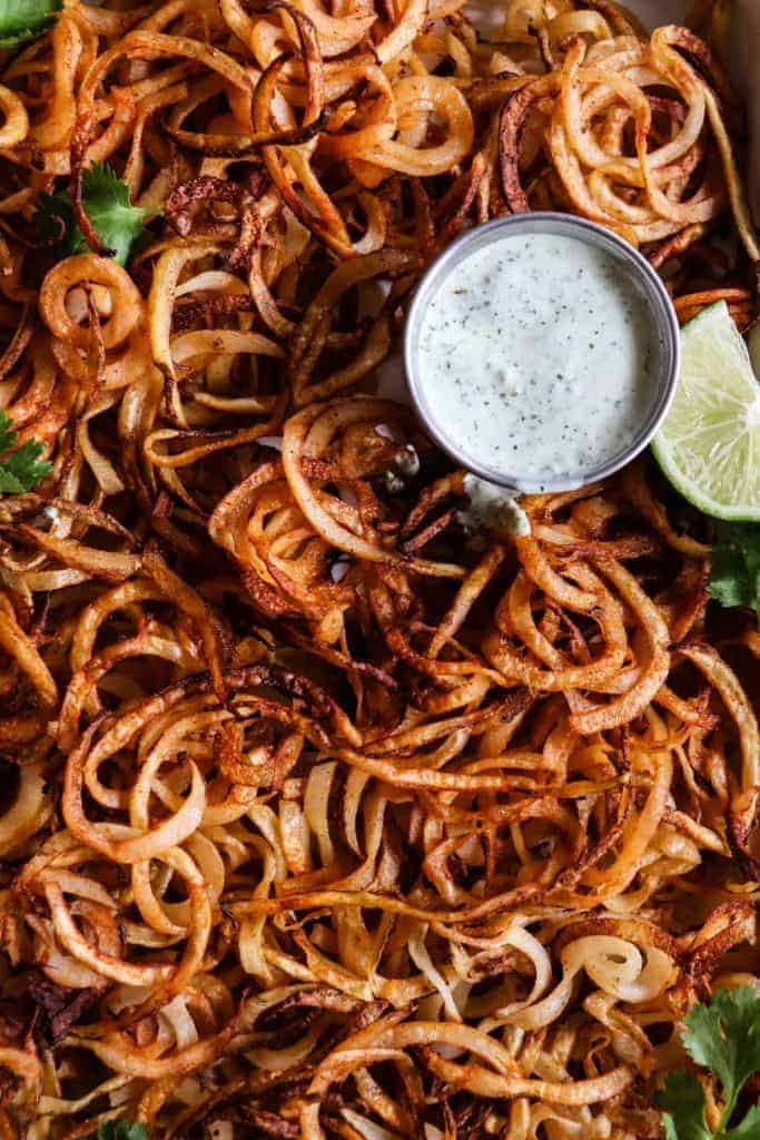 Homemade crispy fries seasoned with chile powder and hit with a dose of lime. Perfect side dish to any Mexican dish or just snacking on! 