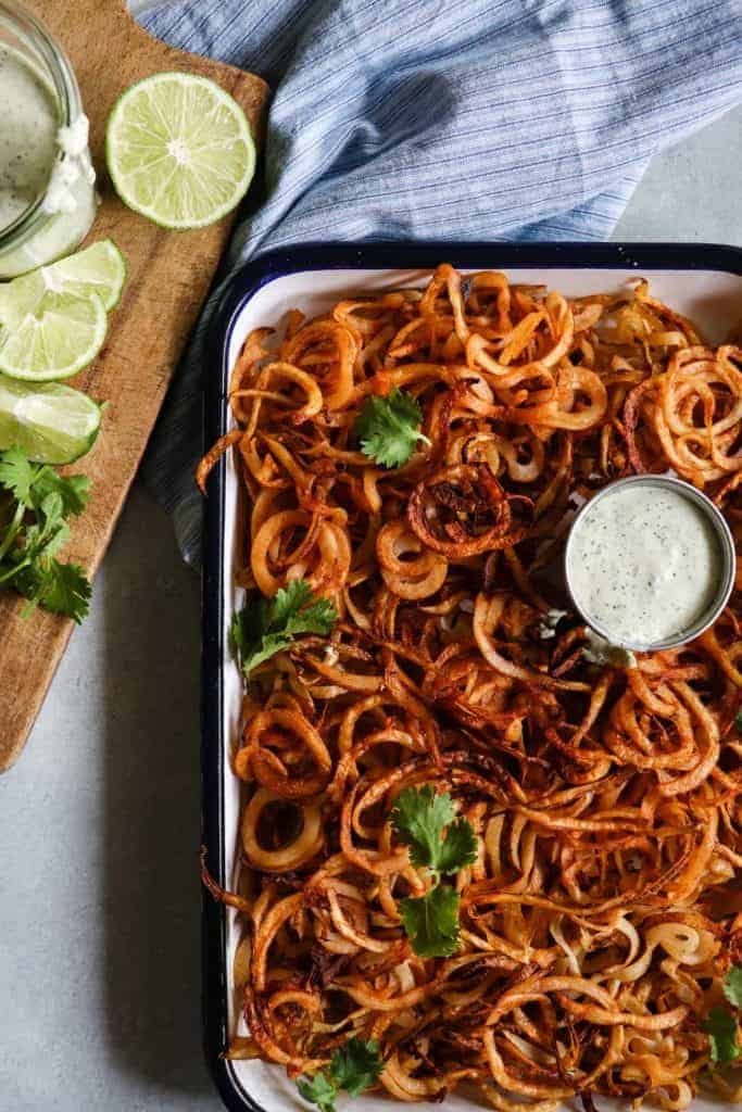 Homemade crispy fries seasoned with chile powder and hit with a dose of lime. Perfect side dish to any Mexican dish or just snacking on! 